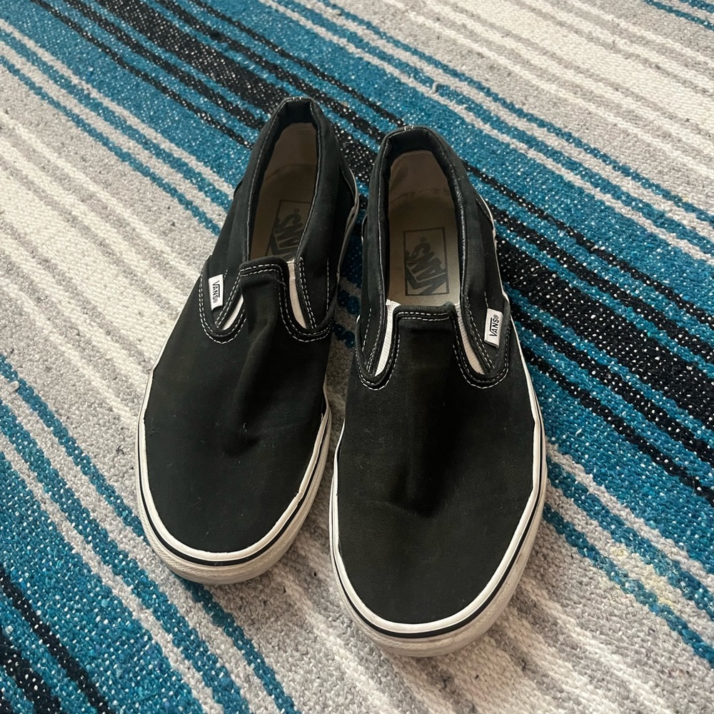 Black slip on vans men’s 8.5 womens 10
